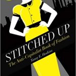 Black and yellow runway book cover of stitched up