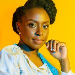 Portrait photo of Chimamanda Ngozi Adichie on a yellow background